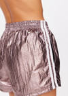 THE UPSIDE women's metallic Billie Run Short is a mid rise, lightweight short featuring an elasticated waistband, drawcord, side seam pockets. Lined with mesh.