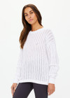 THE UPSIDE women's white Muse Chesca Long Sleeve Knit is made from organic cotton. The long sleeve knit has a relaxed silhouette with a soft ribbed neckline, cuffs and hem. Designed for walking and recovery.