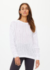 THE UPSIDE women's white Muse Chesca Long Sleeve Knit is made from organic cotton. The long sleeve knit has a relaxed silhouette with a soft ribbed neckline, cuffs and hem. Designed for walking and recovery.