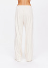 THE UPSIDE women's cream Josie Straight Leg Pant is made from recycled fabric. The wide leg pant features a white contrast bind and elasticated pockets and drawcord giving a retro sport look. Designed for walking and recovery.