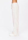 THE UPSIDE women's cream Josie Straight Leg Pant is made from recycled fabric. The wide leg pant features a white contrast bind and elasticated pockets and drawcord giving a retro sport look. Designed for walking and recovery.