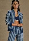 THE UPSIDE women's blue striped Joie Pari Zip Jacket is a jacquard zip through sports jacket, featuring knitted navy and cream stripe tape down sleeves for style and welt pockets and ribbed hem and cuffs for comfort. Designed for leisure and recovery.