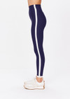 THE UPSIDE women's navy Hamptons 25 inch Midi Pant is made from recycled soft peached fabrication with a brushed handfeel and a breathable, quick drying effect. The high waisted pant has a V panel waistband and features colours of cream and white for an elevated look. Designed for yoga and pilates.