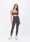 THE UPSIDE women's navy Caleta 25 inch Midi Pant is in our speciality fabric with gold lurex. The mid rise midi pant is designed for everyday movement from yoga to running.