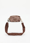 THE UPSIDE women's leopard Panthera Voyage Crossbody Bag is made from recycled fabric. The mini crossbody bag features adjustable straps. Designed for travel.