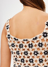 THE UPSIDE women's natural Luminary Lily Crochet Top is made from cotton. The crop top features scoop neck. Designed to wear over our ballet bras or bikini.