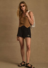 THE UPSIDE women's black Saddle Up Ziggy Short is made from hemp and cotton blend. The gym short features elastic waist and pockets. Designed for comfort.