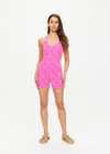 THE UPSIDE women's Nevada Lia Cutout Onesie is made from specialty fabric. The one piece playsuit features removable cups. Designed for yoga, barre and pilates.