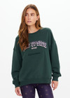 THE UPSIDE women's dark green Alumni Coolum Crew Neck Sweater is made from organic cotton and feature small side splits, front zip pocket and side pockets.