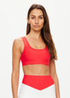 THE UPSIDE women's red Pacific Harley Scoop Neck Bra is made from recycled peached. The supportive sports bra features removable cups. Designed for yoga, pilates and barre.