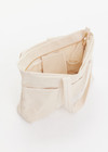 THE UPSIDE women's cream Marbella Beach Club Tote is made from cotton linen blend. The large tote bag features outer pockets and removable matching purse.