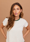 vTHE UPSIDE women's cream Dusty-Ray 70s Tee is made from hemp and organic cotton blend. The classic inspired t-shirt features rib neckline. Designed for comfort.