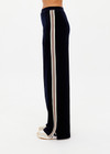 THE UPSIDE women's navy Monaco Freya Wide Leg Pant is a soft recycled velour fabric with side seam pockets and an elasticated waistband. The perfect travel pant.