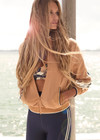 THE UPSIDE women's yellow Le Sport Margot Zip Jacket is designed for a slim fit and features pockets and textured knit side tapes. Perfect for travel and everyday.