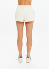 THE UPSIDE women's creme organic cotton Hamilton Dee Short is designed for a regular fit, featuring a elasticated waistband with side seam pockets. Made for everyday.