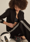 THE UPSIDE women's black Moto Kasia Zip Through Jacket is a soft suiting lenzing fabrication with welt pockets. The ideal travel jacket.