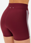 THE UPSIDE women's merlot Oxford 4 Inch Spin Short features an elastic drawcord through waist with mint side seam stripes. Made for yoga & pilates.