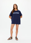 THE UPSIDE women's navy organic cotton Stardust Sammi Tee is designed for an oversized fit and features printed puff logo at front. Made for lifestyle.
