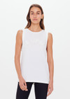THE UPSIDE women's white organic cotton jersey Jeet Tank Top is a relaxed fit with folded detail and a printed horseshoe logo. The perfect everyday muscle tank.