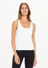 THE UPSIDE women's white Balance Seamless Lenny Tank is form fitting with a scoop neckline, cross back straps and an internal shelf bra for extra support. Made for yoga & pilates.
