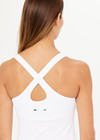 THE UPSIDE women's white Balance Seamless Lenny Tank is form fitting with a scoop neckline, cross back straps and an internal shelf bra for extra support. Made for yoga & pilates.