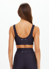 THE UPSIDE women's black Oxford Harley Scoop Bra offers a supportive & comfortable fit made from eco tech performance fabric and features removable cups and contrast white stripes down sides. Made for high impact.