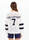 THE UPSIDE women's creme organic cotton Fenway Sebastian Knit Crew is designed for a relaxed fit and features ribbed neckline and cuffs with The Upside 7 logo on back.