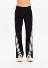 THE UPSIDE women's black Petra Flare Pant is made from soft suiting fabric and features elasticated waistband, side pockets and contrast cream stripes down side seams. Made for lifestyle.