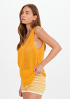THE UPSIDE women’s organic cotton yellow Fenway Wales Knit Tank has a relaxed fit with ribbed neckline and armholes in an open knit. Made for everyday wear.