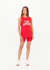 THE UPSIDE women's red organic cotton Jeet Tank Top has a relaxed fit with folded armhole detail and cream varsity logo at chest. Made for everyday wear.