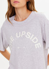 THE UPSIDE women's grey organic cotton Sammi Tee is designed for an oversized fit and features a printed horseshoe logo in cream at the front. The perfect everyday piece.