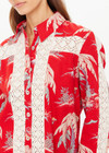 THE UPSIDE women's red Palma Bobbi Collared Shirt features sleeve plackets, pearlised buttons, and cream crochet lace panels. Perfect for travel or lifestyle.