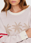 THE UPSIDE women's creme organic cotton Palma Joni Knit Crew features raglan sleeves, palm tree chest design, and red stripes around back and sleeves. Made for lifestyle.