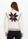 THE UPSIDE women's cream Swiss Dhemi Knit Jacket features a zip through opening, removable sleeves and is lined with polar fleece. Designed for Aprs-ski and winter wear.