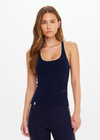 THE UPSIDE women's navy organic cotton Equine Raf Knit Tank is designed for a slim fit and features a racerback design with tan stripe detailing along neck and armhole. Made for everyday.