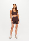 THE UPSIDE women's brown Peached Jade Racerback Bra offers a soft & supportive fit and features removable cups and moisture control properties. Made for yoga & pilates.