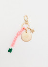 THE UPSIDE multi Yin Yang Keyring charm features a gold metal star, embossed logo and neon pink-white knotted paracord. Made for lifestyle.