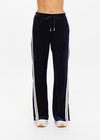 THE UPSIDE women's navy polka dot Spellbound Roma Pant is true to size and features metallic silver spots on velvet fabrication and side seam pockets. Made for lifestyle.