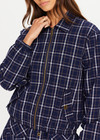 THE UPSIDE women's check Valencia Lexi Collared Jacket is relaxed fit with zip-through bomber style, collar, and front flap pockets with antique brass buttons. Made for lifestyle.