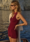 THE UPSIDE women's maroon organic cotton Simi Knitted Playsuit is fitted with a low V-neck and button-up closure with antique brass buttons. Made for lifestyle.