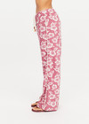 THE UPSIDE women's pink floral organic cotton Lahaina Charli Drawstring Pant has a low-rise straight leg fit with a soft elasticated waistband with drawcord. Perfect for everyday or holiday.