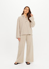 THE UPSIDE women's khaki recycled cotton Soho Rhea Collared Top is designed for a relaxed fit and features a collar at neck with front button opening. Made for lifestyle.
