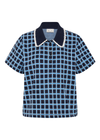 THE UPSIDE women's navy and blue plaid cotton Clubhouse Dom Polo Shirt is a relaxed fit and features a knitted collar with cream crochet detailing on edge. Made for tennis, golf & pickleball.