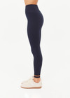 THE UPSIDE women's navy Form Seamless 25inch Legging is firm and supportive and features contrast tan stripes. Made for yoga & pilates.