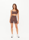 THE UPSIDE women's navy & camel recycled jacquard Castilla 5inch Spin Short is high-rise with a V panel waistband. Made for yoga & pilates.