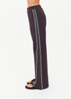 THE UPSIDE women's black Petra Flare Pant features soft, flared fabrication with grey splits at hem, side seam pockets and an elasticated waist. Made for lifestyle.