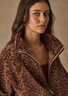 THE UPSIDE women's leopard recycled Harlow Fleece Pullover is designed for a relaxed fit and features a quarter zip, raglan sleeves, zip pockets, elasticated waist and cuffs. Made for lifestyle.