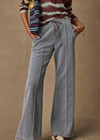 THE UPSIDE women’s sparkle grey Galaxia Marnie Wide Leg Pant is high rise with side pockets, an elasticated waistband and a maroon drawcord. Made for lifestyle.