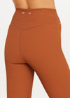 THE UPSIDE women’s brown recycled jacquard Mariana 25inch High Midi Legging offers a soft and supportive fit and features a high rise waist and V panel waistband. Made for yoga and pilates.
