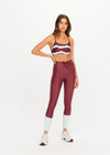 THE UPSIDE women’s tie dye recycled Rio Badu Crossback Sports Bra is a soft and supportive and features a scooped neckline, crossback straps and removable cups. Made for yoga and pilates.